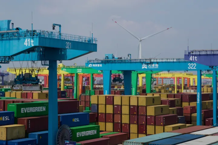Shipping containers are stacked at a port in Tianjin, China