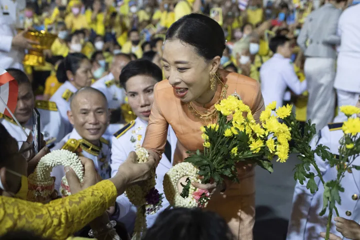 Thai Princess Bajrakitiyabha Mahidol shakes hands while meeting supporters in Bangko
