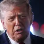 AP President Donald Trump talks with reporters
