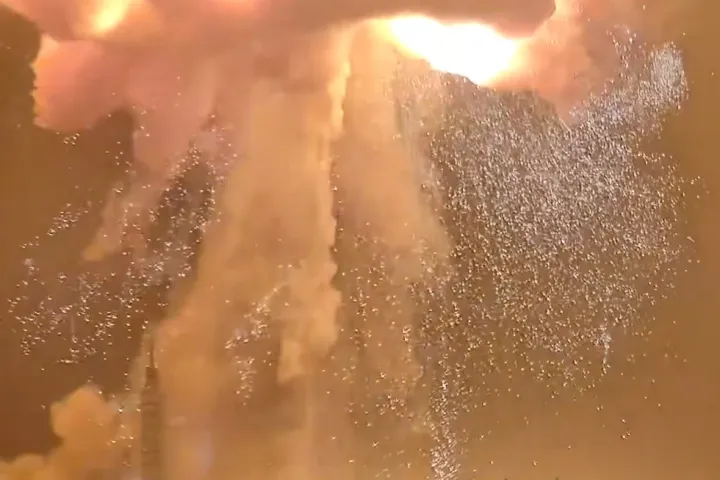 A Blue Origin New Glenn rocket explodes during an engine-firing test 