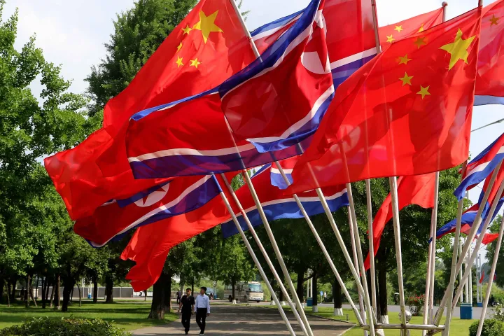 AP A street is decorated with the flags of China and North Korea in Pyongyang