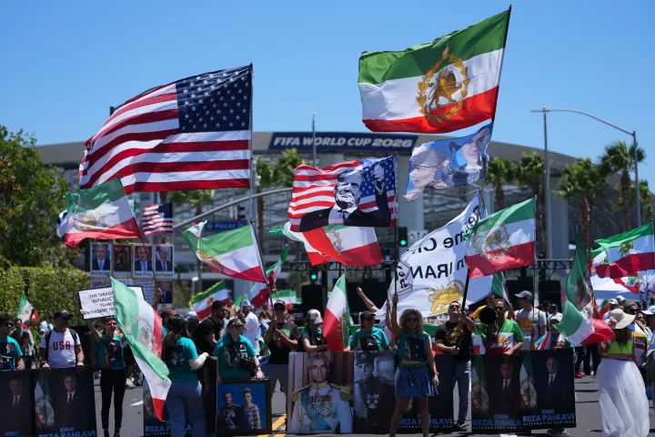 AP People protest outside Los Angeles Stadium before the World Cup Group G