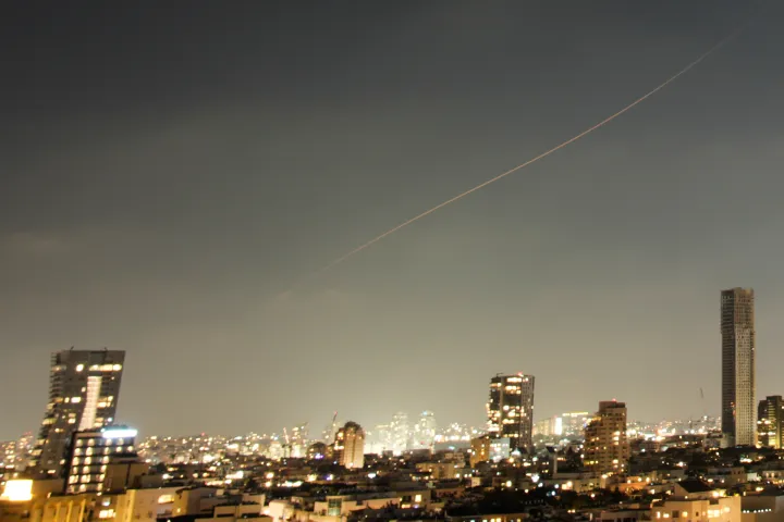 APA projectile streaks through the sky over central Israel during an Iranian missile attack