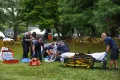 First responders help a woman who was injured the mass shooting that left 12 people injured 
