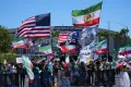 AP People protest outside Los Angeles Stadium before the World Cup Group G