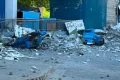 P This shows vehicles damaged by debris after powerful earthquake